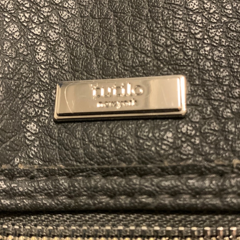 Ladies Tutilo New York faux leather back pack